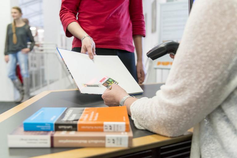 a book being checked out